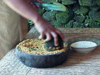 Grinding curry by hand
