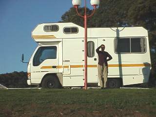 Kristina in front of the home on wheels