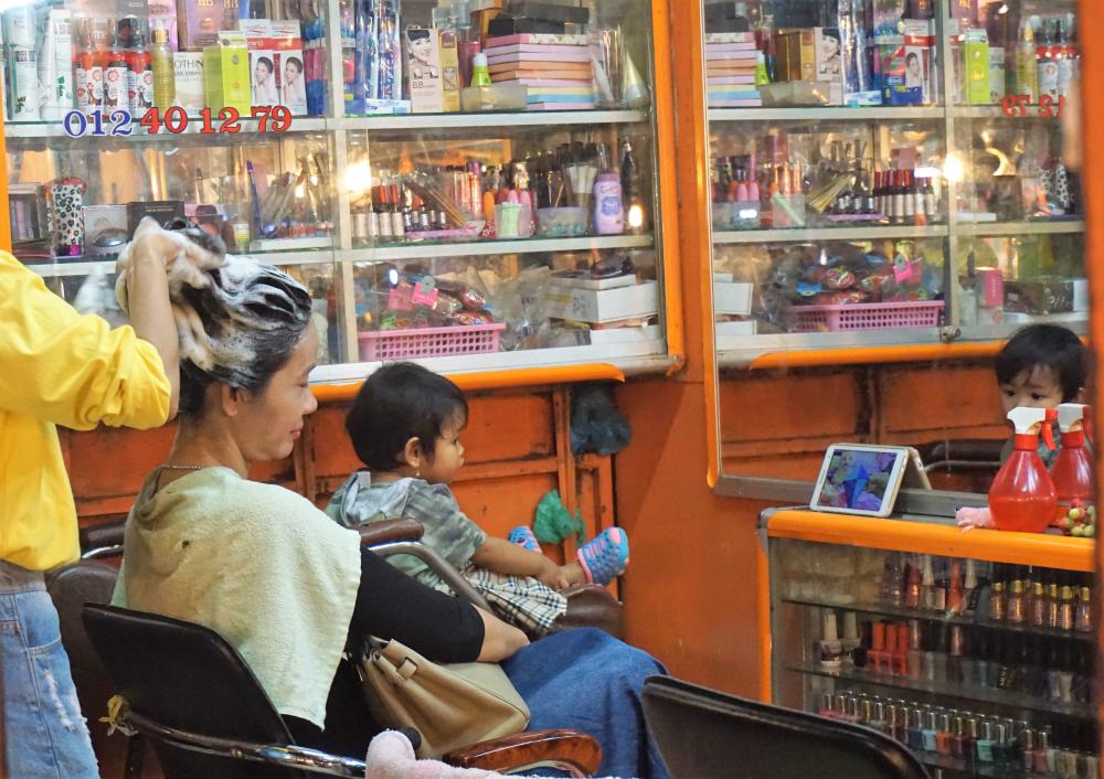Hair washing in the old market Siem Reap