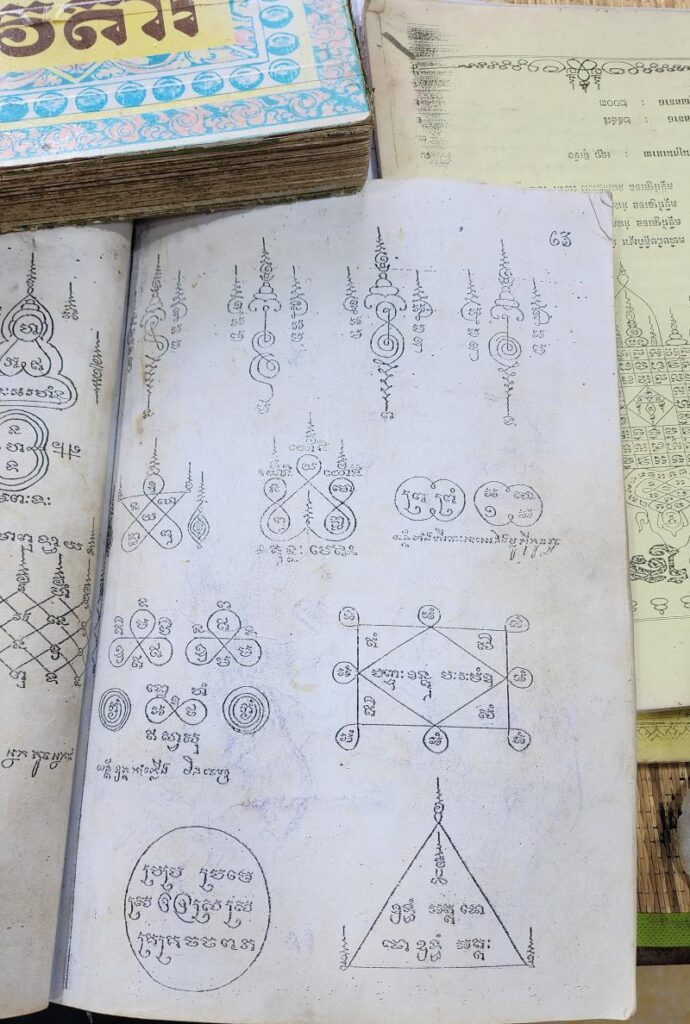 Sak Yant designs in a book
